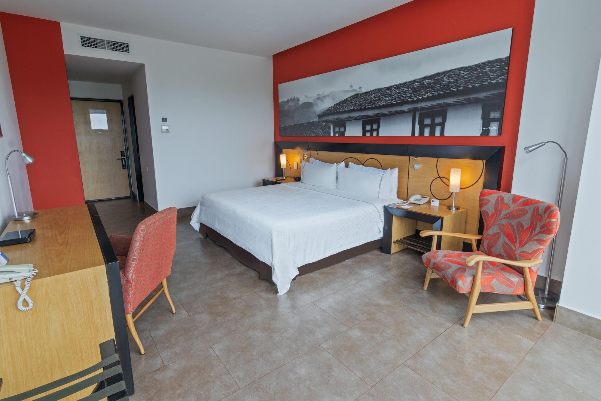 Sonesta Hotel Pereira Cerritos Extérieur photo A room at the hotel